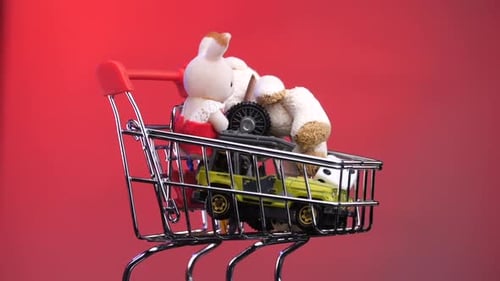 Concept of Online Shopping for Toys in Store Toys are Placed in a Shopping Cart