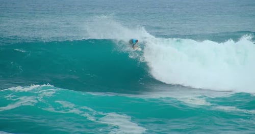 Hawaii Surfer Riding Wave in Slow Motion