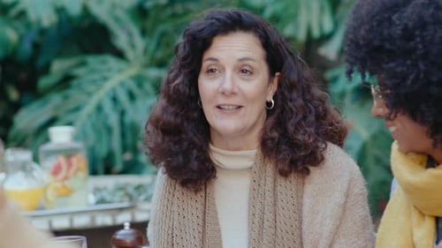 Friends Laughing Together Outdoors in Natural Setting