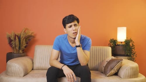 Man with toothache.