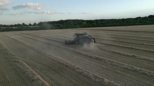 Establishing Drone Shot of Combine Harvester with Orange Flashing Light Harvesting UK