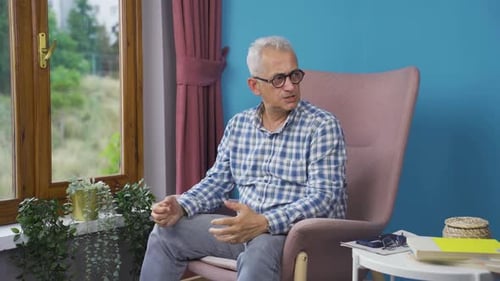 Man having a nervous breakdown at home is shouting.