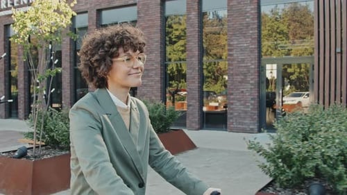 Modern Woman Enjoying Riding Bicycle
