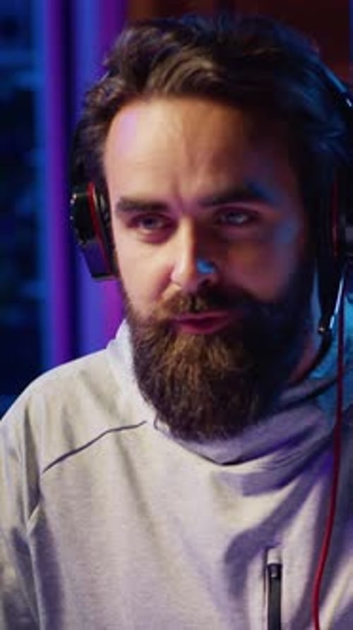 Man Wearing Headphones in Portrait Orientation