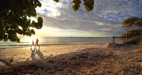 Romantic couple holding hands on beach at sunset a forever love story
