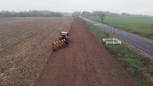 Tractor plowing the field in Ukraine