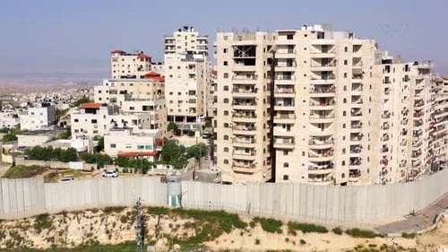 Security wall with Israeli idf watch tower Close to Anata Refugee Camp- Aerial