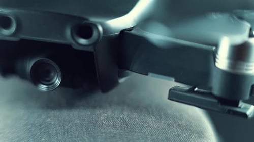 Drone Camera Lens on a stabilizer, propellers and sensors, hyper close up, aerial photography gear,