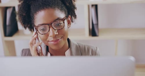 4k video footage of a young attractive businesswoman working in her office
