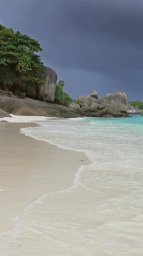 Sand Tropical Beach and Storm Sky