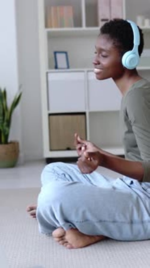 Woman Enjoys Music With Headphones