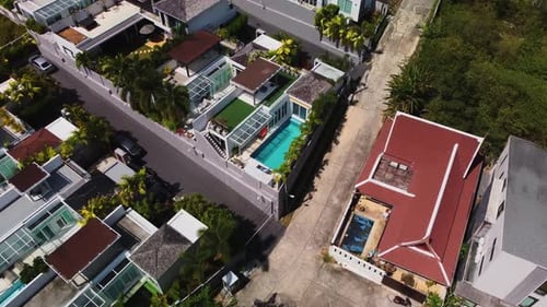 Aerial View of Luxury Homes with Swimming Pools