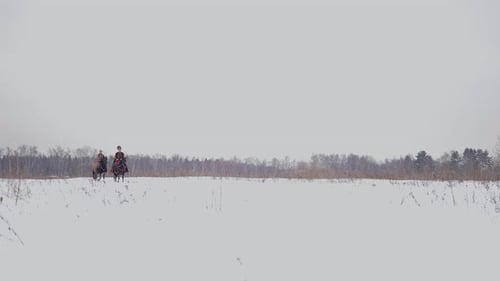 Man and Woman in Traditional Suits of Eastern Europe and Ruthenia Riding Horse in Winter Slowmotion
