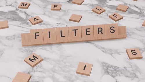 Wooden Word Tiles Forming Filters on Marble Background