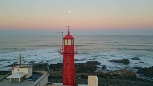 Evening Lighthouse Rising Sea Shore Washed By Foamy Waves Aerial High Beacon