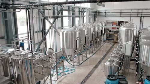 Modern Brewery Interior with Stainless Steel Tanks