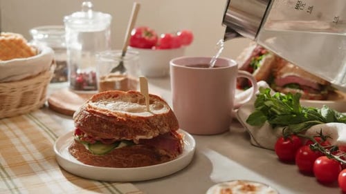 American Pastrami Sandwich with Ham Meet Cuts in Restaurant Cafe Kitchen Fresh Cucumber on Bread