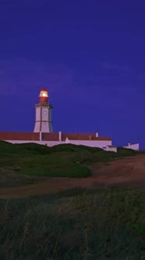 Lighthouse Sending Its Light Beam at Night Cape Espichel Portugal