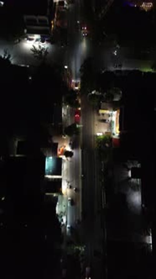 Vertical drone footage of Limboto Majesty Tower or Pakaya Tower at night
