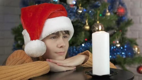 Festive Child Mood By Christmas Candle