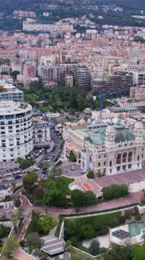 Vertical Drone Shot of Downtown Monte Carlo, Monaco, Central Plaza Buildings and Traffic