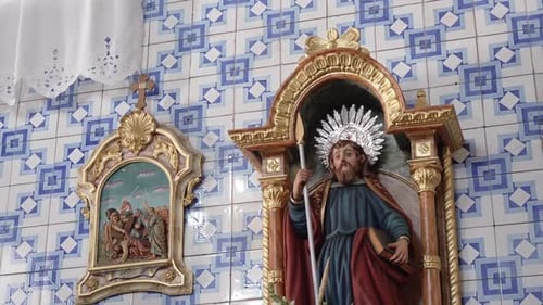 Religious Statue on Ornate Church Wall