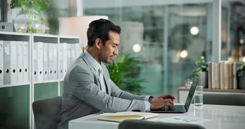 Finance, laptop and typing with business man at desk in office to update online account or report