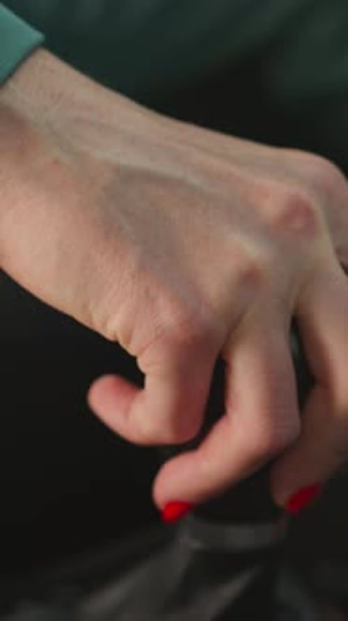 Hand Shifting Gear Stick in Vehicle