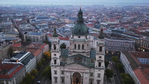 The intricate architecture of St. Stephen’s Basilica shines in the soft morning light above the