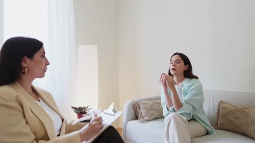 Adult Woman Talking with Therapist