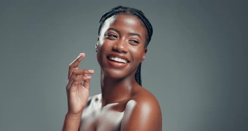 Beauty, smile and skincare with black woman in studio for self care, happy and shine