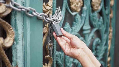 Gate Door Was Locked with Padlocks and Chains