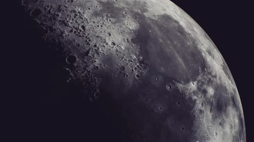 Stunning Close Up View of the Moons Surface Showcasing Craters and Texture