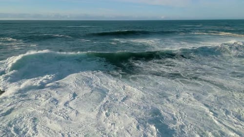 Stormy Sea. Big Foamy Waves Breaking Over Shore. Slow Motion