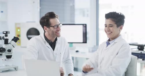 Scientist, high five and laptop in laboratory, research analysis and online results