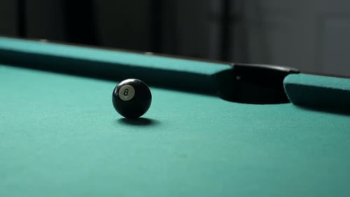 Sinking Eight Ball into Side Pocket in Slow Motion