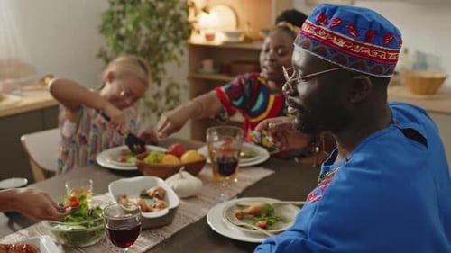 Family Meal Together at Dining Table