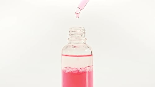 Cosmetic Bottle with Pipette on White Background Cosmetic Spa Medical Skin Care Advertising of a