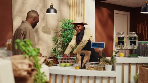 Customer Buying Produce at Local Indoor Market