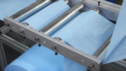 Production Line Connects Strips of Fabric for Medical Masks