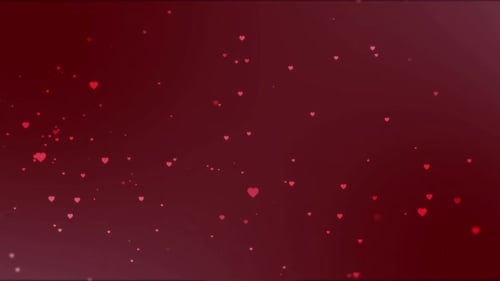 Pink heart shapes falling on dark red background