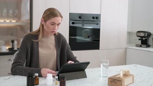 Woman Telemedicine Consultation Holding Blister Pack Medicine