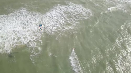 Aerial view of Kite surfer riding the smooth water of The Mediterranean Sea