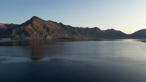 Drone Flight Over Tranquil Lake and Majestic Mountains, Queenstown
