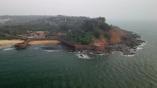Aerial View of Aguada Fort Coastline in Goa India at Sunset