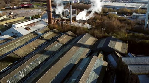 Pilkington glass factory warehouse buildings aerial view establishing industrial town manufacturing