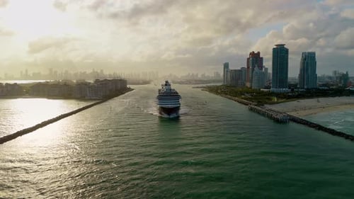 Large Cruise Liner Slowly Departing From Port Miami Wide Drone View