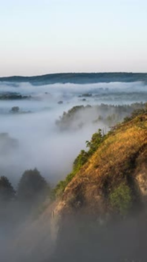Misty Landscape View at Sunrise or Sunset