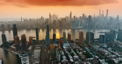 Amazing orange sky at sunset over the great New York city.