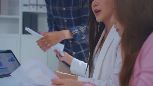 Asian young businessman and businesswoman people working in office.